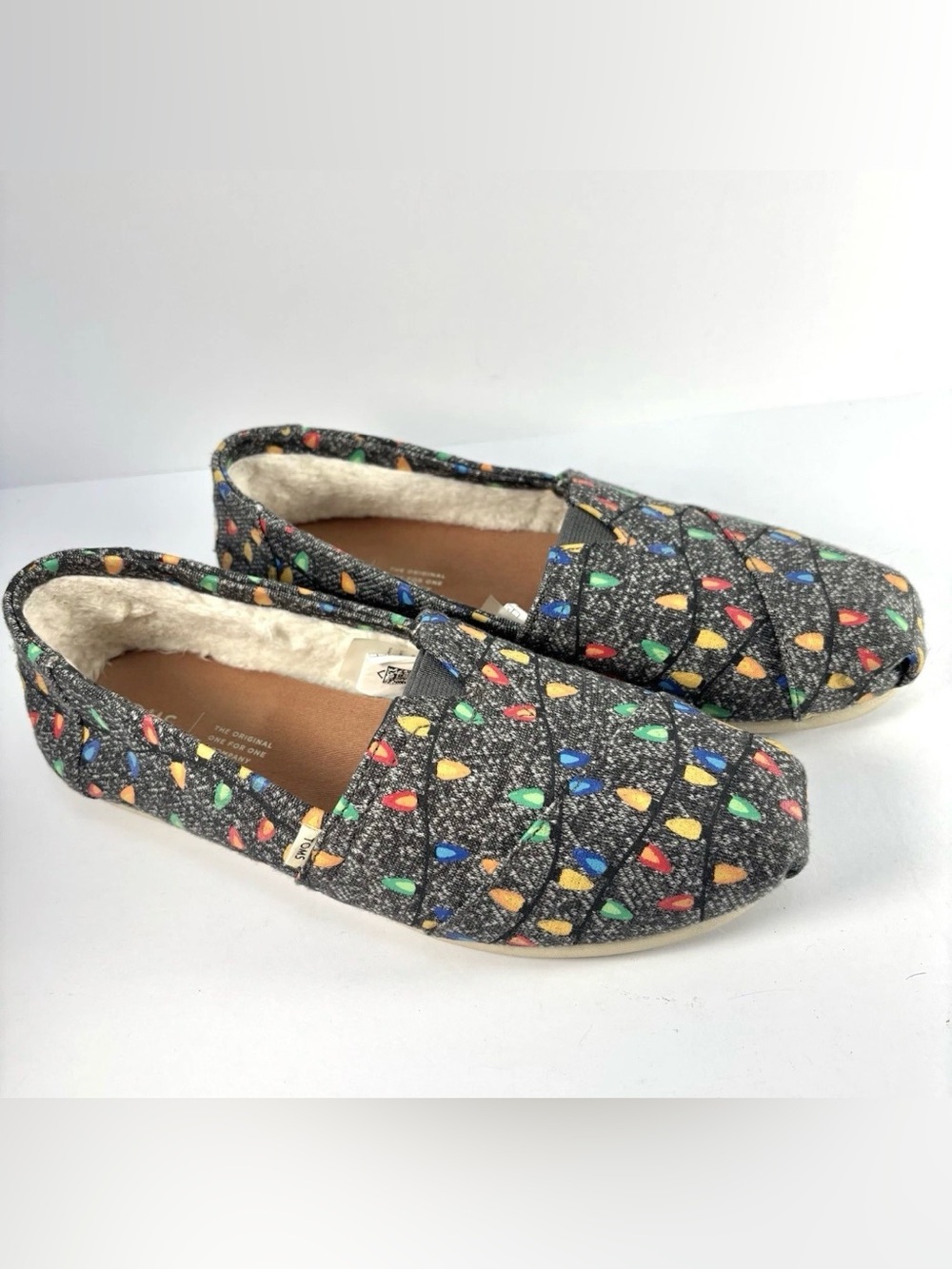 TOMS Christmas Slip-On Shoes with Multicolor Light Bulb Print